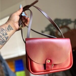 Vibrant Red Leather Crossbody Bag with Sleek Design